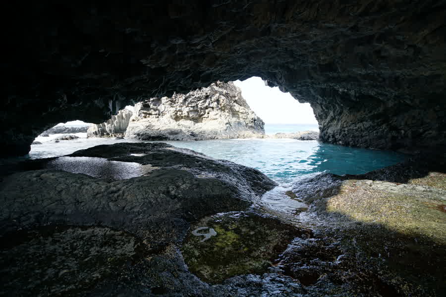 Charco Azul, a natural seawater pool formed in basalt on the coast of El Hierro