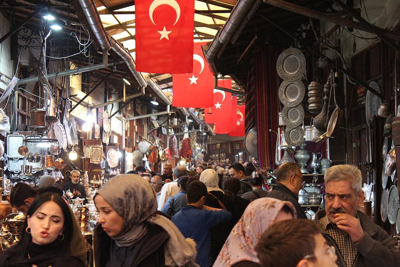 A bustling bazaar in Gaziantep, Turkey, packed with shops selling spices, copper items, and Turkish delights